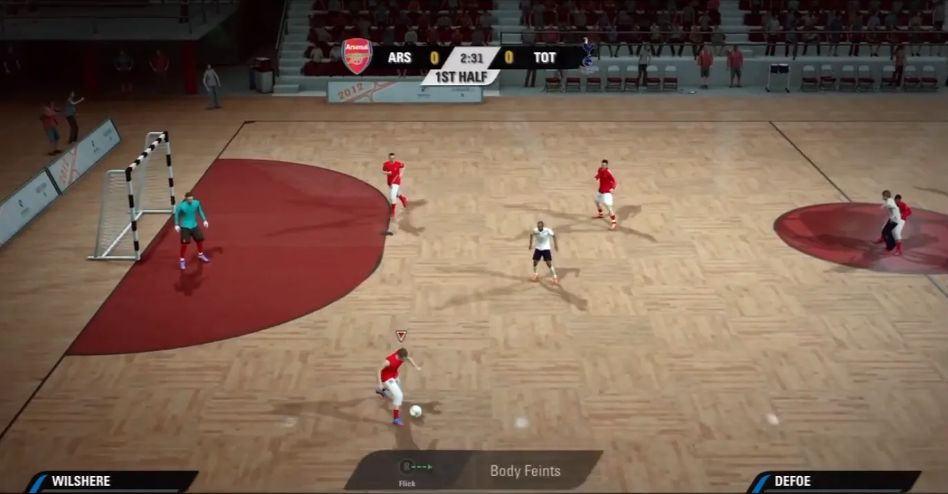 Partida de futsal entre Arsenal e Tottenham no FIFA Street, com a quadra de madeira e o placar no topo